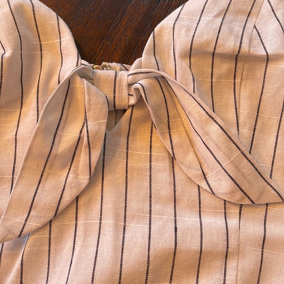Crop top. White with black pin stripes. Tie front. Zipper back. Medium - Picture 2 of 4
